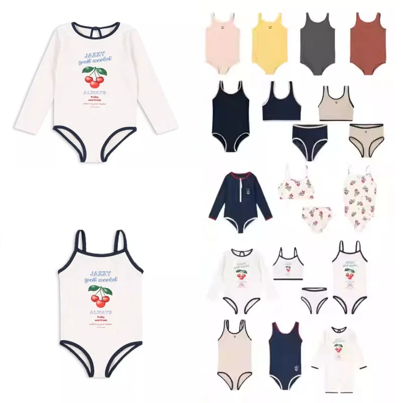 

Детский купальник-двойка для девочек 2026 года: белый с вишневым принтом и темно-синей отделкой, милый купальный костюм для пляжа и бассейна