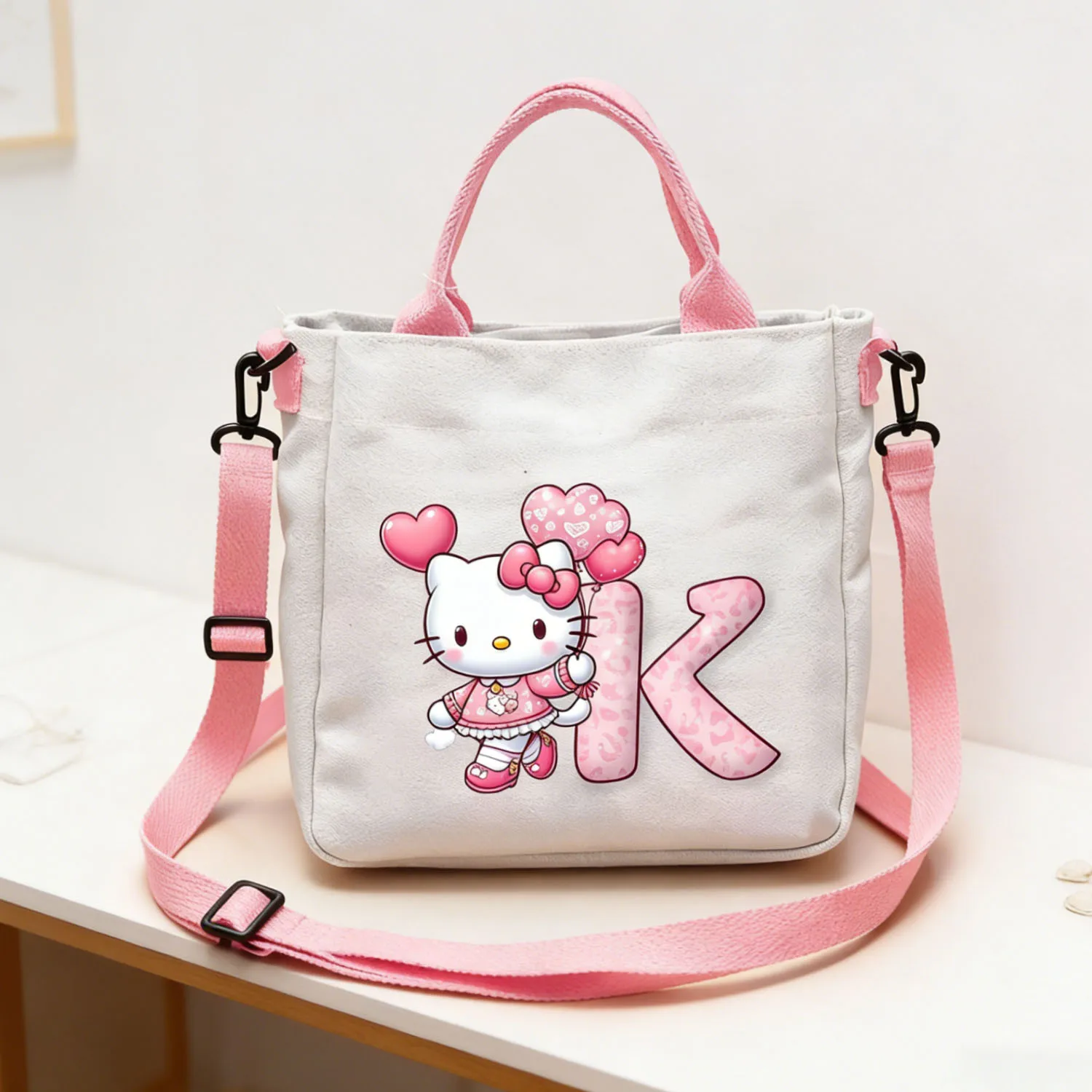 

Hello Kitty Shoulder Bag Cartoon 26 Letter Handbag Woman Girls Large Capacity Crossbody Bag Fashion Portable Canvas Bags Gift
