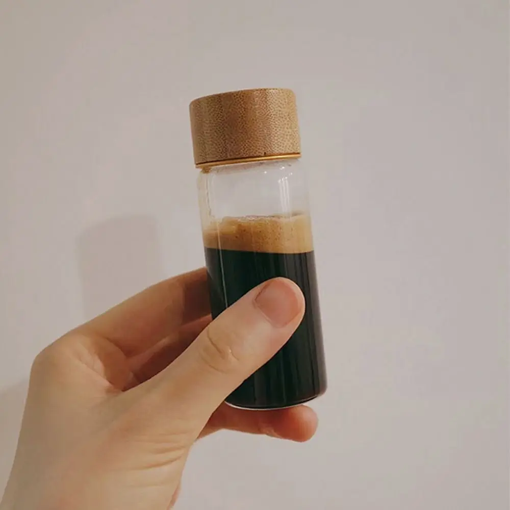 

High Quality Dispensing Bottles Glass Sealed Spice Jars with Wood Lids Transparent Storage Tank Storage Tool Round Spice Jar