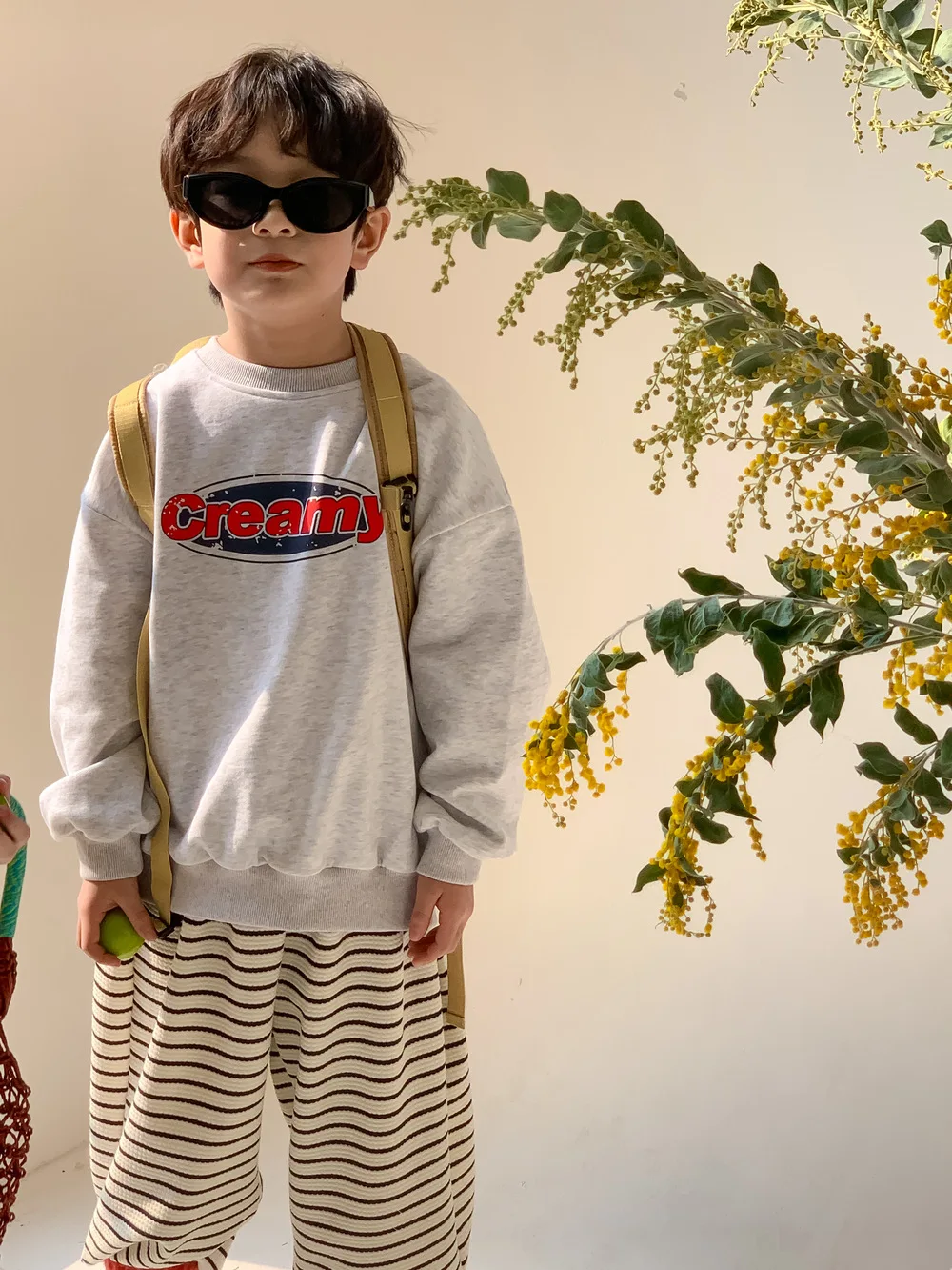 Felpa con cappuccio per bambini 2024 primavera stile coreano lettera stampata ragazzi e ragazze Casual girocollo manica lunga Casual allentato Top