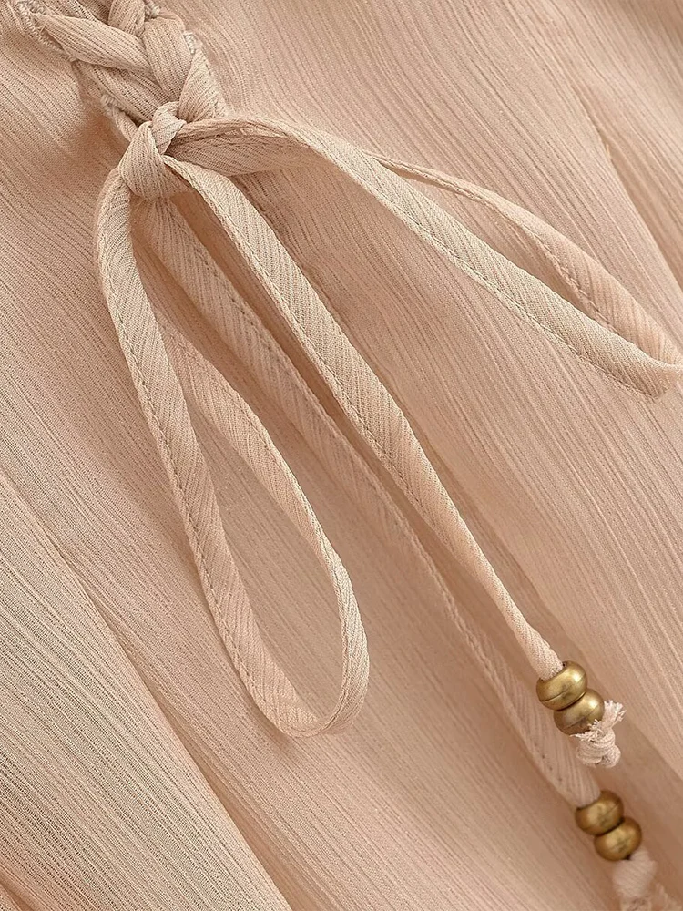 European style new women's fashion all-match temperament semi-transparent waist placket tie design trumpet sleeve top