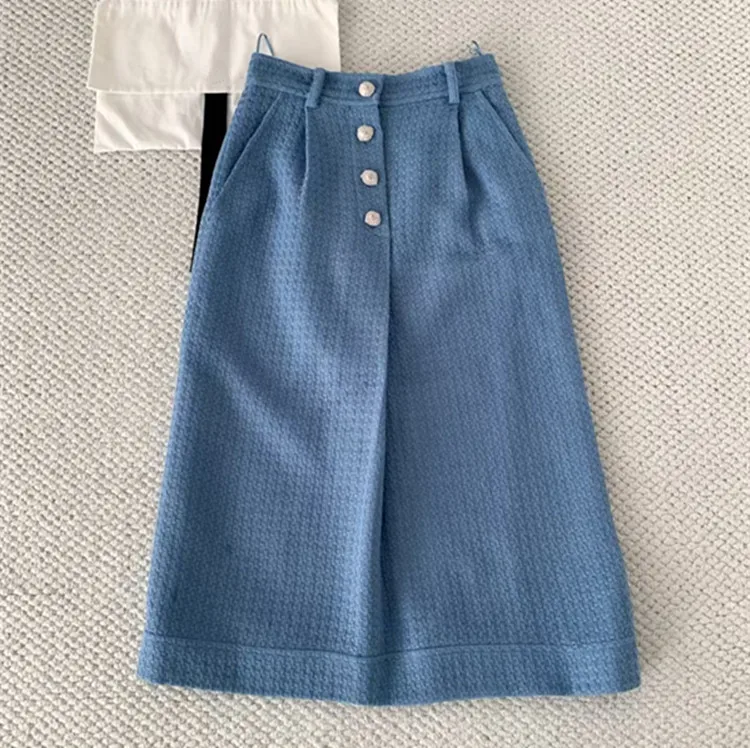 ชุดเสื้อโค้ททวีดปกสีน้ำเงินแขนยาวสไตล์ยุโรปแบบสั่งตัดสำหรับผู้หญิง คอลเลคชั่นฤดูหนาว 2026 พร้อมกระโปรงเข้าชุด