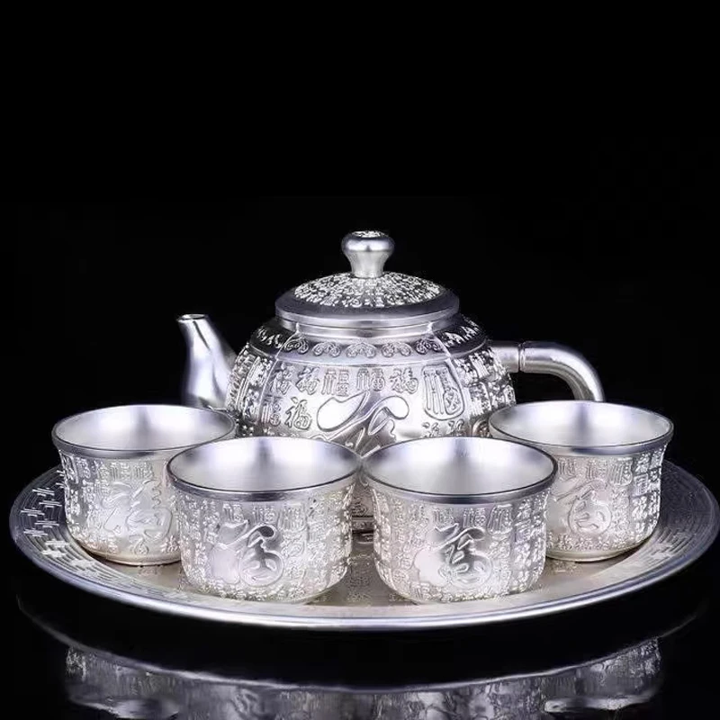 

Sterling silver tea set 999 sterling silver tea set full silver wine set 1 plate 1 pot 4 cups Chinese kung Fu tea set New Year