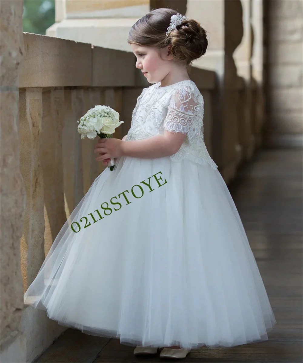 

Customzied Made Flower Girl Dreses Embellished Lace Peplum Bodice with Sleeves Finishing at the Elbows and Pearl Button