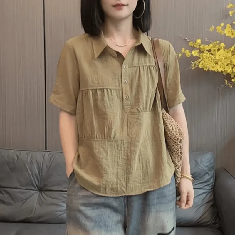 Mode revers épissé couleur unie plis Blouses vêtements pour femmes 2025 été nouveaux hauts amples décontractés chemises de banlieue