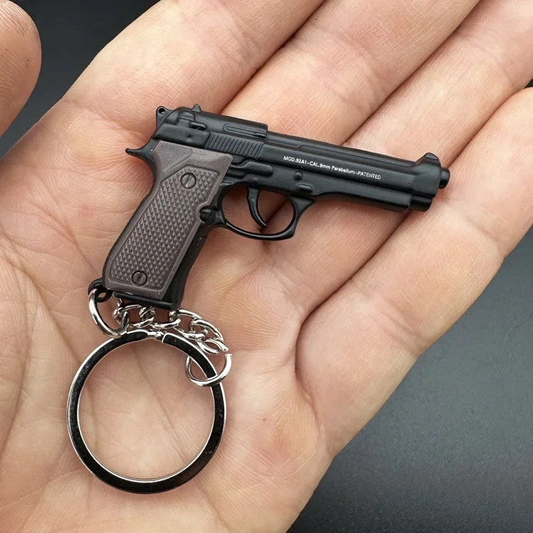 1PCS Mini M92f M1911 Small Gun Metal Plastic Pistol Keychain Model Creative Pendant Tools