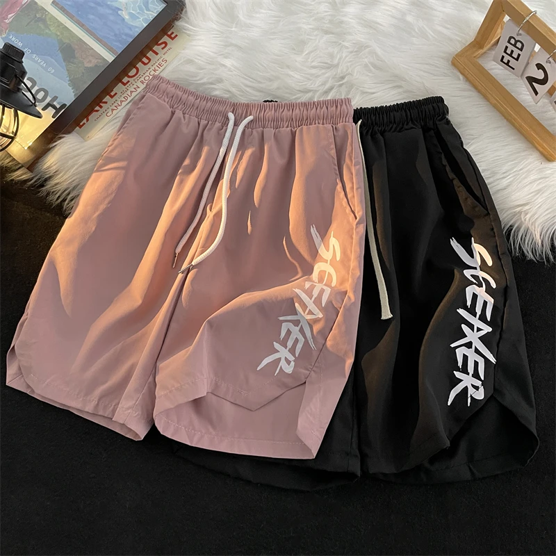 

Мужские тонкие повседневные шорты, новые летние американские уличные свободные черные брюки с надписью, модные универсальные дышащие брюки на шнурке