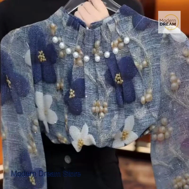 

French high-quality blue collar printed shirt women's spring and autumn new fashion heavy temperament blouse casual Joker top.