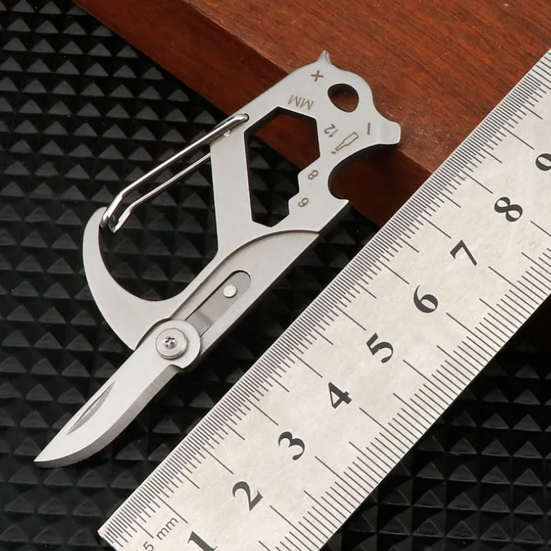 Llavero táctico multiusos con cuchillo plegable de acero inoxidable - imagen 3