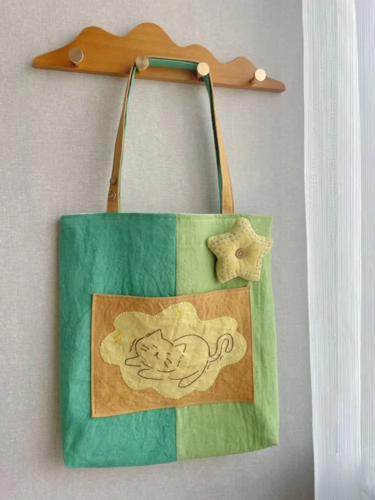 

2025 New Cartoon Cat Shoulder Bags Versatile Splicing Canvas Bag Simple and Unique Handbag
