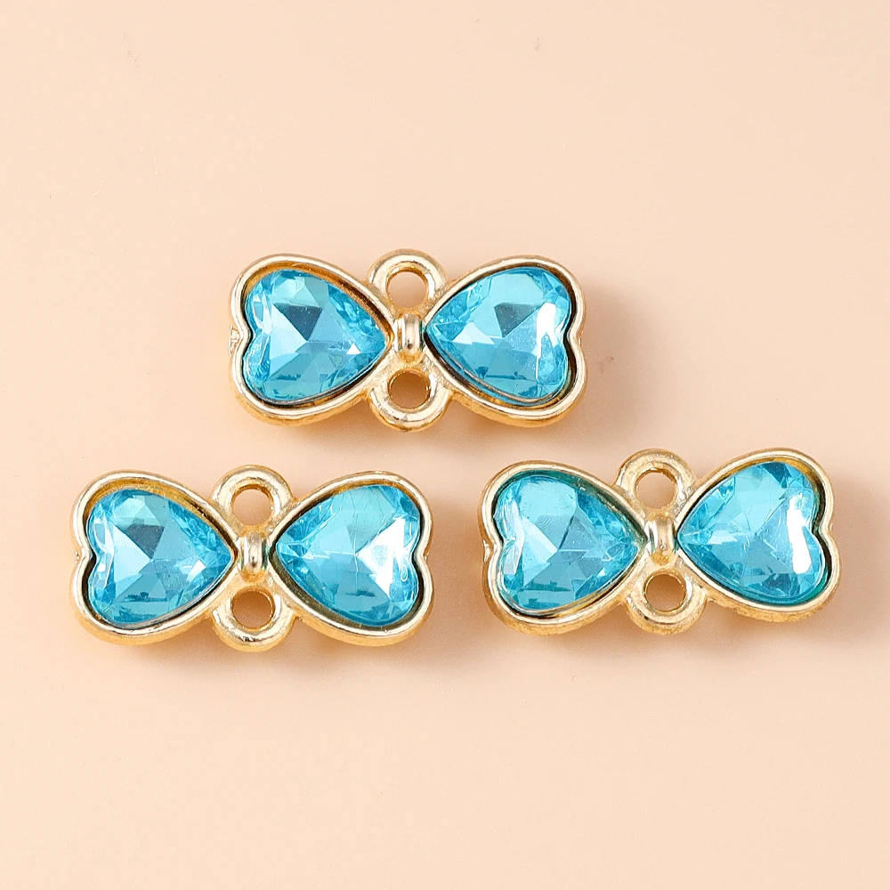 Leslie 10 Stück 12 x 14 mm zarte Doppelloch-Kristall-Bowknot-Charms-Anschlüsse für Halskette, Ohrringe, DIY-Schmuckherstellungszubehör – Detail 5