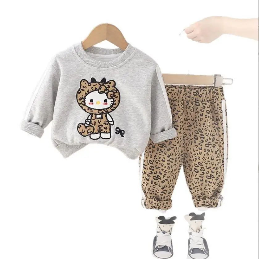 2025 Boutique de primavera Trajes para niñas Diseñador de dibujos animados Lindo Estampado de leopardo Camisetas de manga larga Pantalones Conjuntos de dos piezas Chándales para niños