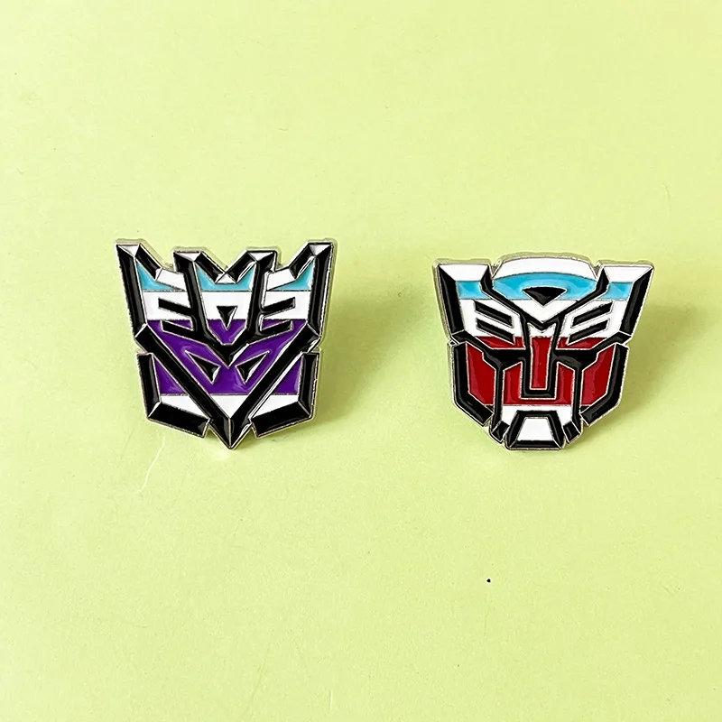 Hasbro Transformers Lapel Pins การ์ตูนตัวอักษรเคลือบ Pin น่ารักเข็มกลัดโลหะ Lapel ป้ายการ์ตูนตลกเครื่องประดับของขวัญ