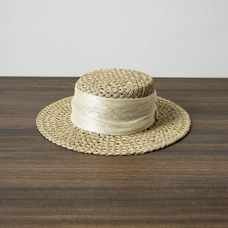 

Spring/summer fashion elegant women's hemp yarn silk bandwidth eaves hand woven seaweed flat hat beach sunshade straw hat