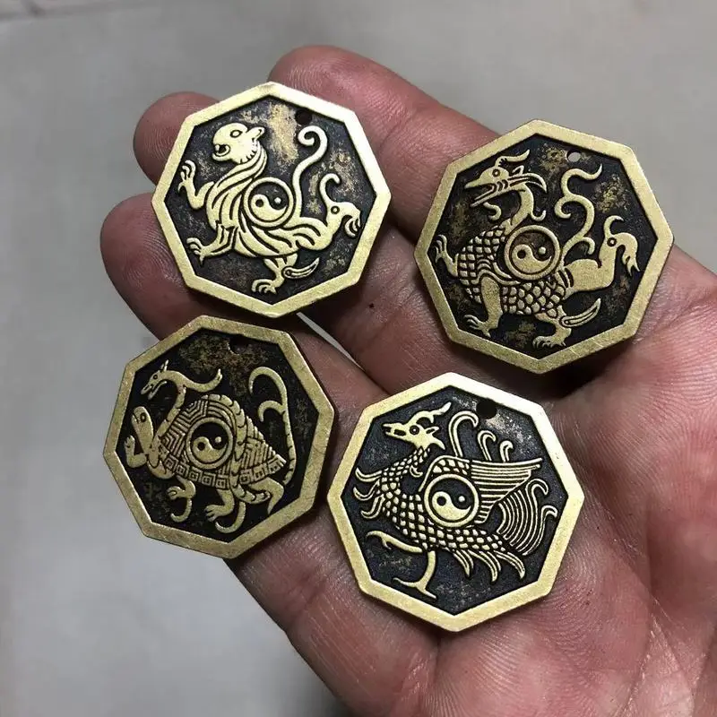 Antiqued brass hexagonal pendant featuring the four mythical beasts: Green Dragon, Red Bird