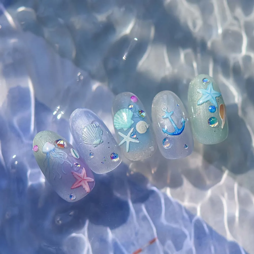 สีฟ้าสีเขียว Ocean สติกเกอร์เล็บแก้วเงา Dolphin Sea แมงกะพรุน Jelly Ocean เล็บสติ๊กเกอร์เล็บอุปกรณ์ปลาดาว