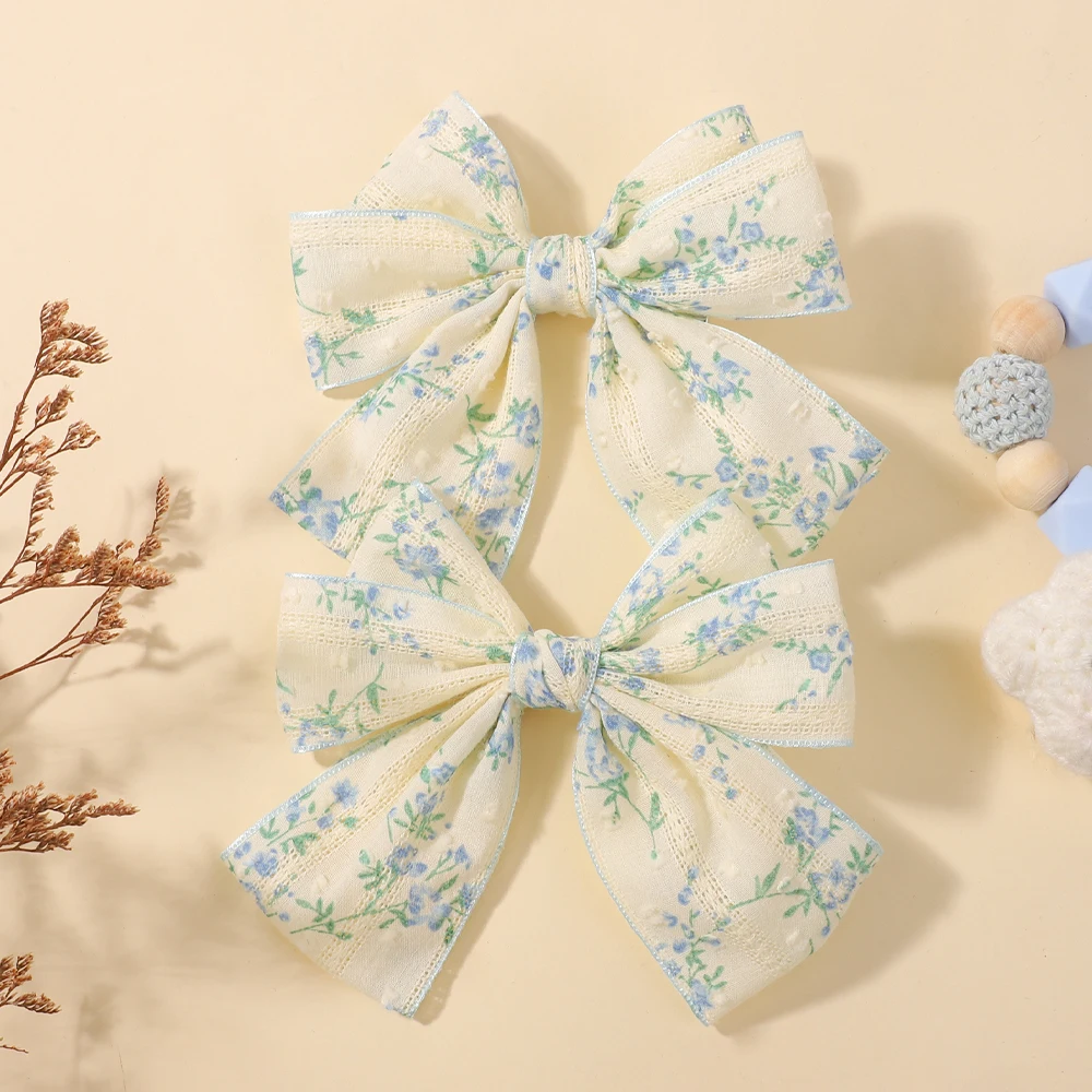 

Набор из 2 заколок-бантиков RAINBOW BOWS: милые хлопковые заколки с цветочным принтом для девочек, очаровательные ленточные заколки-зажимы, праздничные украшения для волос для малышей