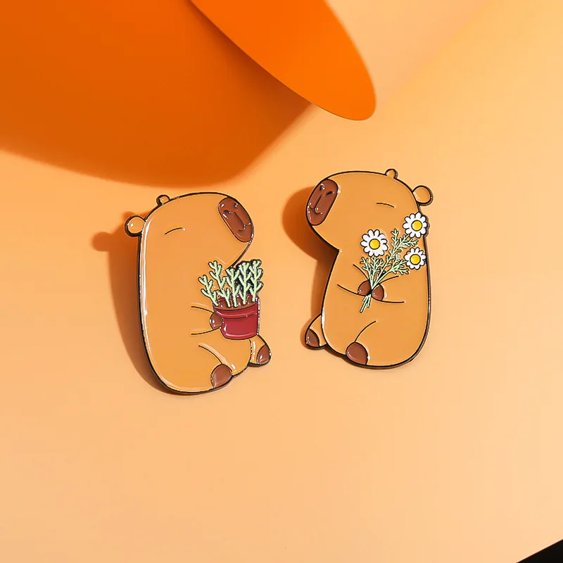 Cute Animal Enamel Pins A cute brooch of two Capybaras holding potted plants and flowers Backpack Accessories Metal Badge Gift