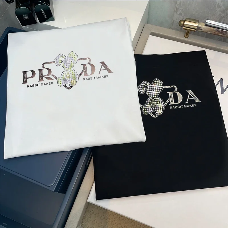 أزياء فاخرة ماركة 2025 صيف جديد مصمم طباعة نمط أرنب القطن الخالص عالية الجودة عادية Harajuku للجنسين حجم كبير