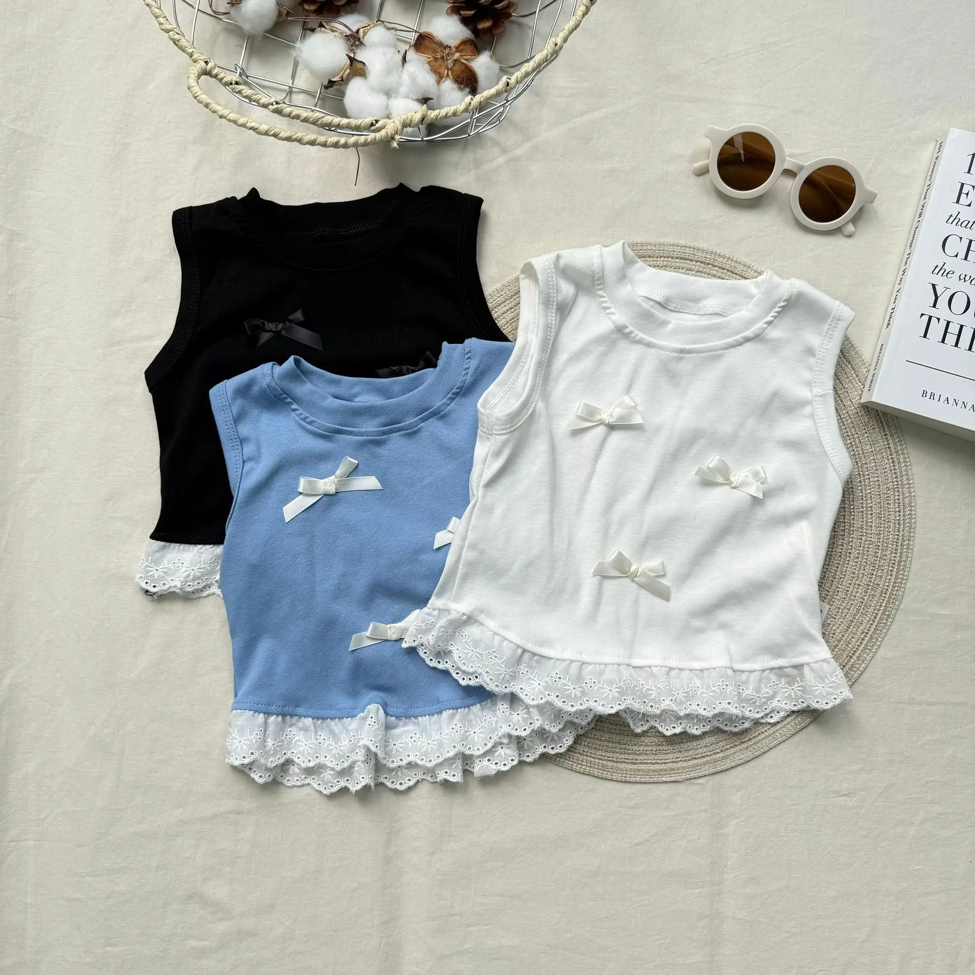 

2025 Summer New Baby Sleeveless T Shirts Cotton Girls Cute Sweet Bow Vest Solid Infant Versatile Princess Tops Toddler Clothes