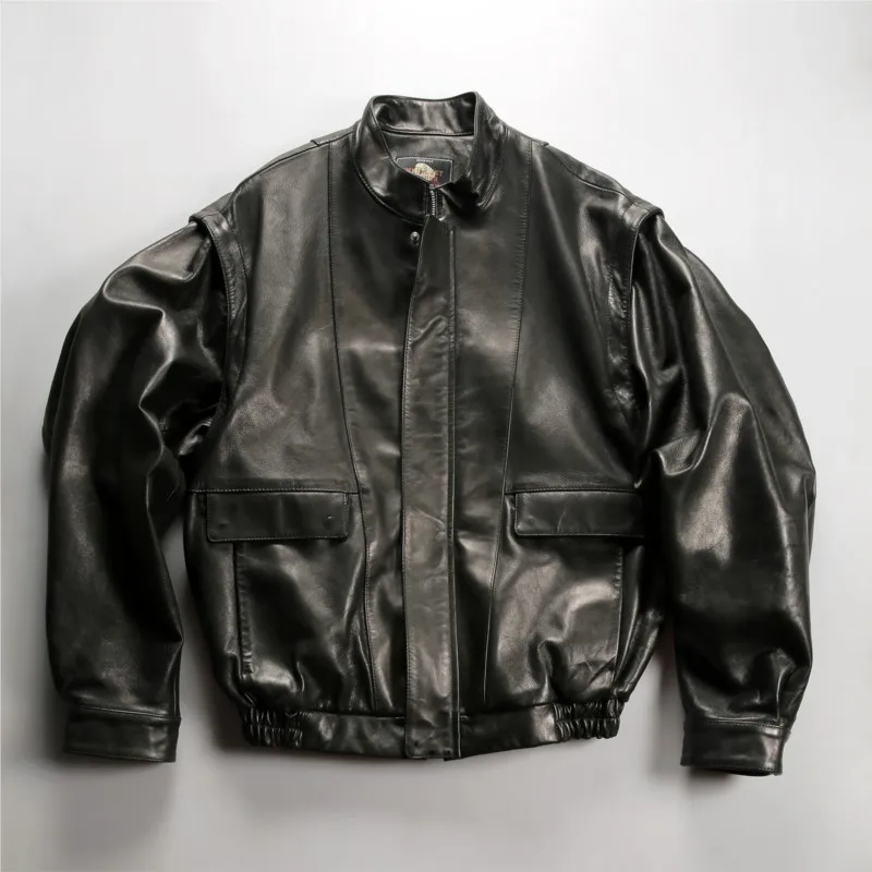 Two men wear leather with detachable sleeves vests and