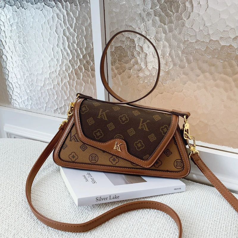 

Elegant Women's Handbag With Messenger Strap Leather Material Classic Tote Design High-Quality Crossbody Option For Ladies