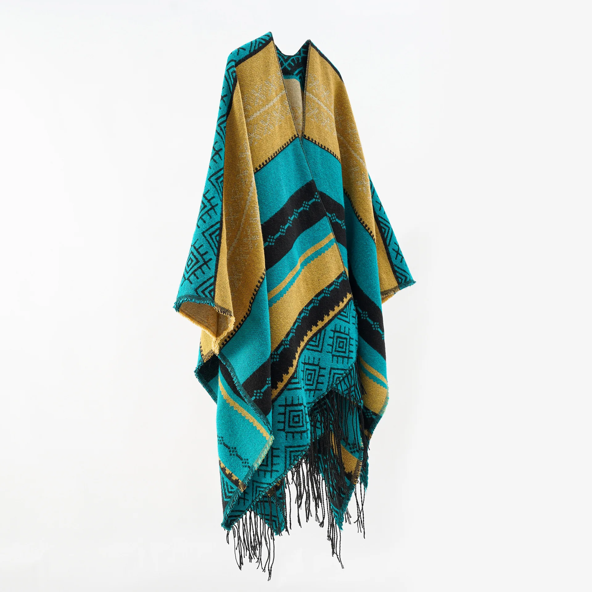 A woman\'s shawl fringed with geometric stripes for casual warmth and cold protection