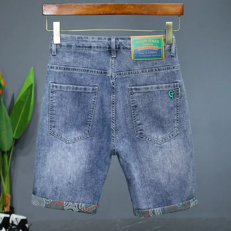 Pantaloncini di jeans da uomo Pantaloni aperti con cerniera invisibile Pantaloni estivi sottili di fascia alta elastici larghi con stampa dritta Pantaloni medi a cinque punti sottili