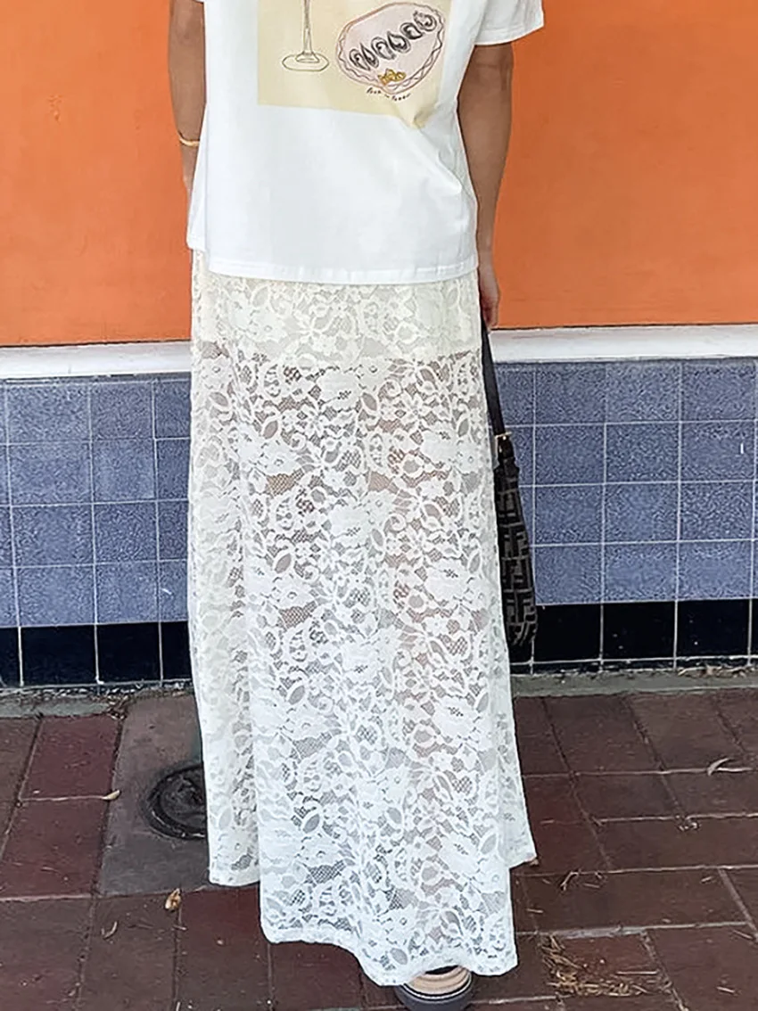 Demi-jupe transparente en dentelle blanche, sexy, européenne et américaine, ajourée, taille haute, jacquard, ligne a, nouvelle collection printemps/été 2025