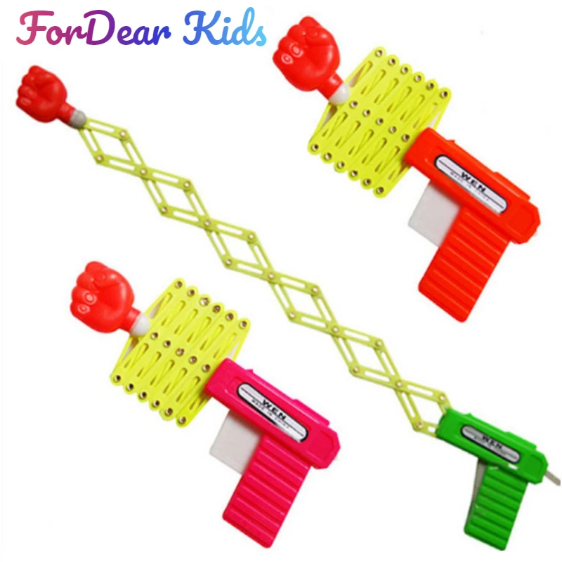 

Retractable Fist Shooter Trick Toy Gun Funny Child Kids plastic Party Festival Gift For fun Classic Elastic Telescopic Fist Toy