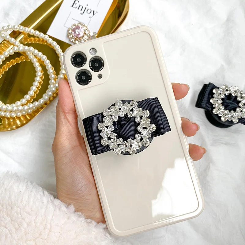 Airbag Telefon Halter Luxus Strass Kreative Schmetterling Bogen Klebstoff Faul Desktop Halter Ins Wind Erweiterbar Telefon Ständer