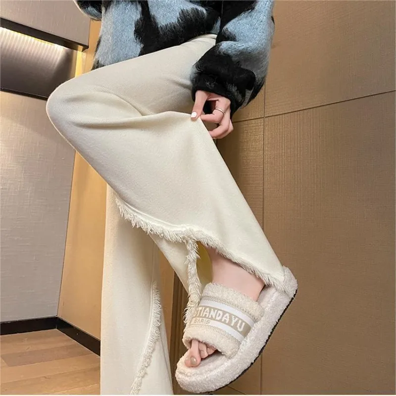 

2024 Autumn-Winter New Women's Soft and Cozy Tassel-Trimmed High-Waist Flared Pants with Slit and Drape Knit Trousers