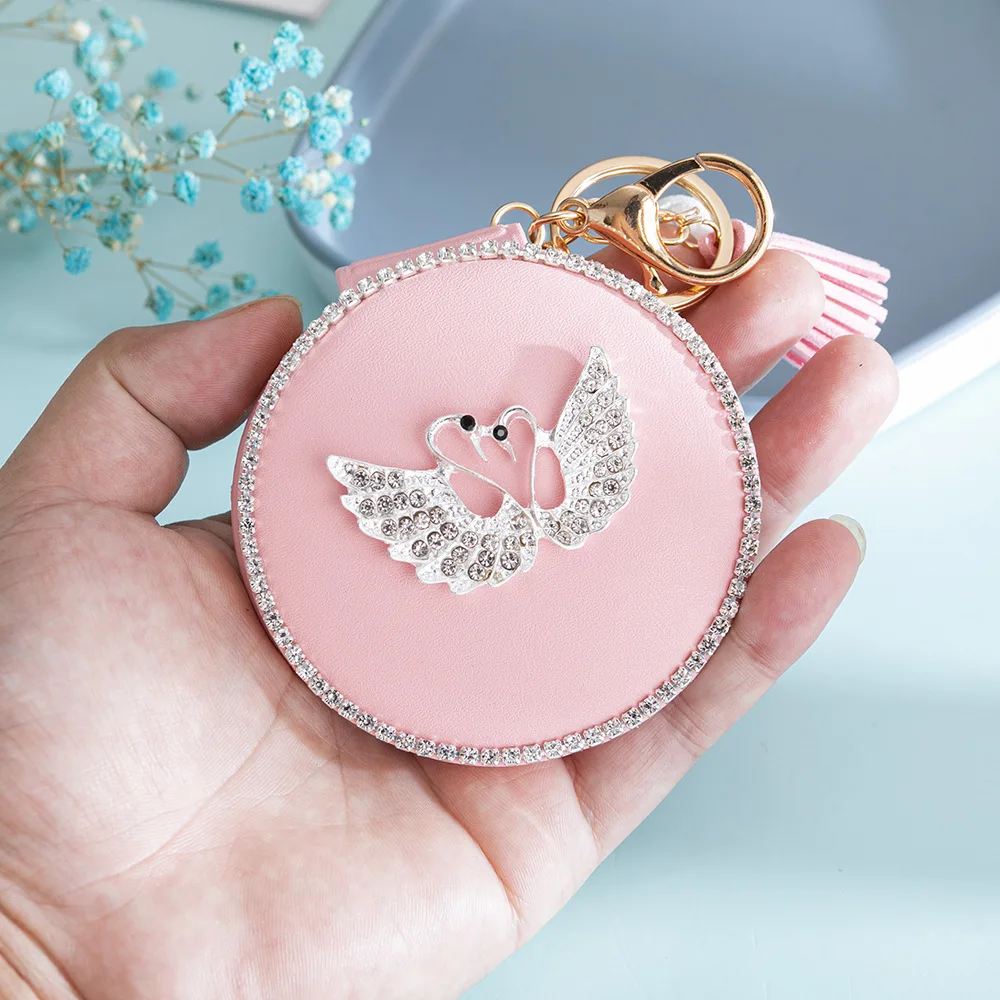 Double-sided Compact Cosmetic Mirror Mini Round PU Makeup Mirror Cute Swan Tassel Portable Makeup Mirror Keychain Bag Ornament