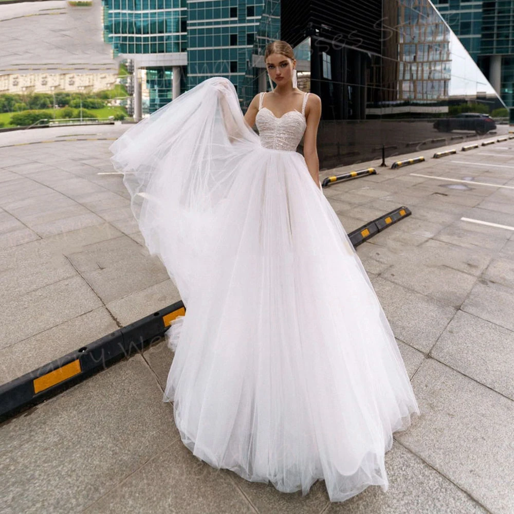 Vestidos De Novia bohemios para mujer, elegantes Vestidos De Novia con tirantes finos, modernos, sin mangas, con espalda descubierta