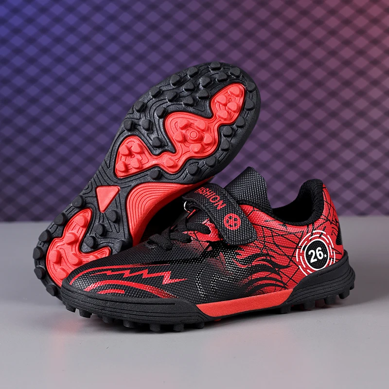 A pair of children's cool flame graphic soccer sneakers, rubber stud sole, cushioned outdoor football footwear XBS-214