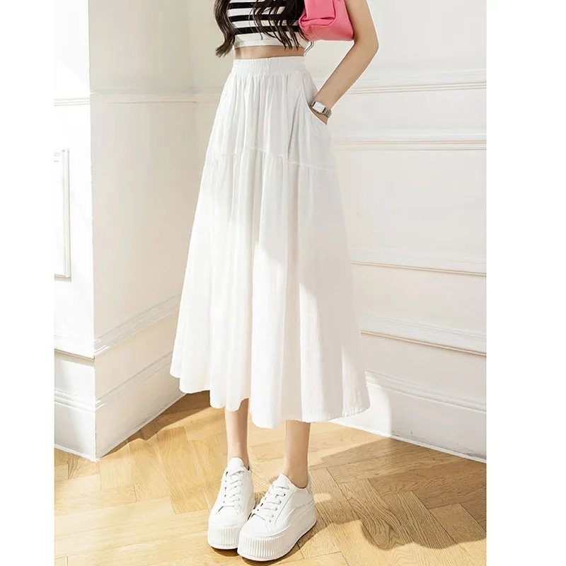 Saia midi branca para mulheres no verão 2025, novo design de cintura alta e emagrecimento, saia casual evasê que cobre os quadris