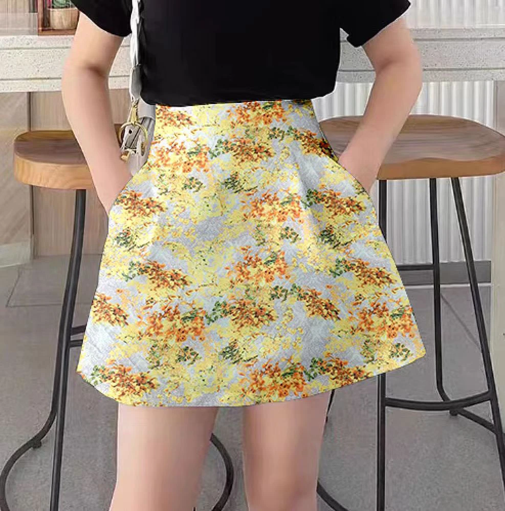하이 웨이스트 플레어 미니 스커트 꽃 프린트 다목적 폴리 에스터 패브릭 포켓 디테일 여름 컬렉션 여성 패션