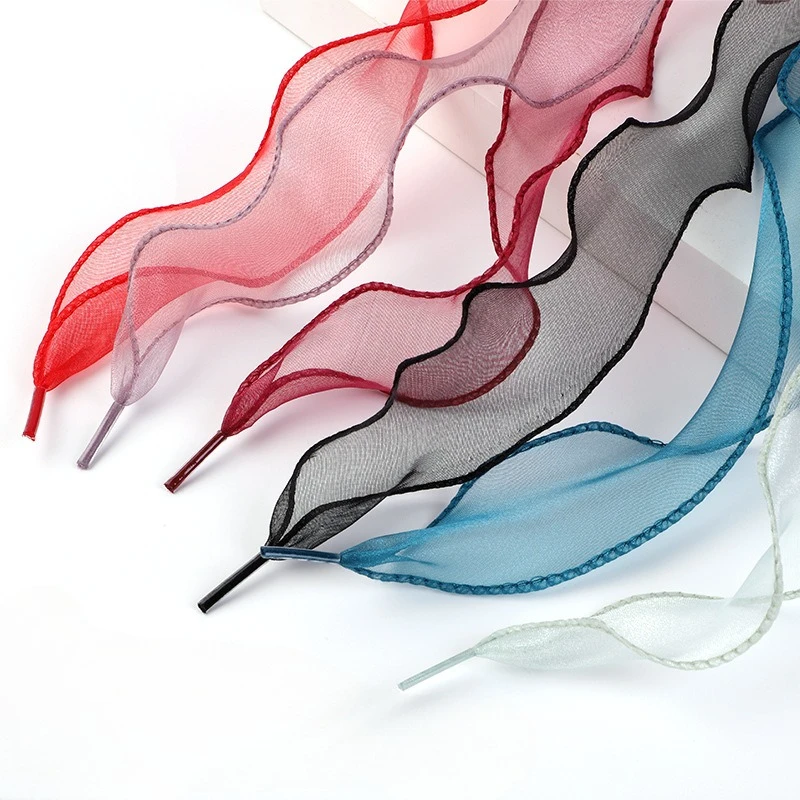 

Пара шифоновых шелковых лампочек «рыбий хвост» и свернутых волнистых сетчатых лампочек, подходящих для парусиновой обуви Air Force One.