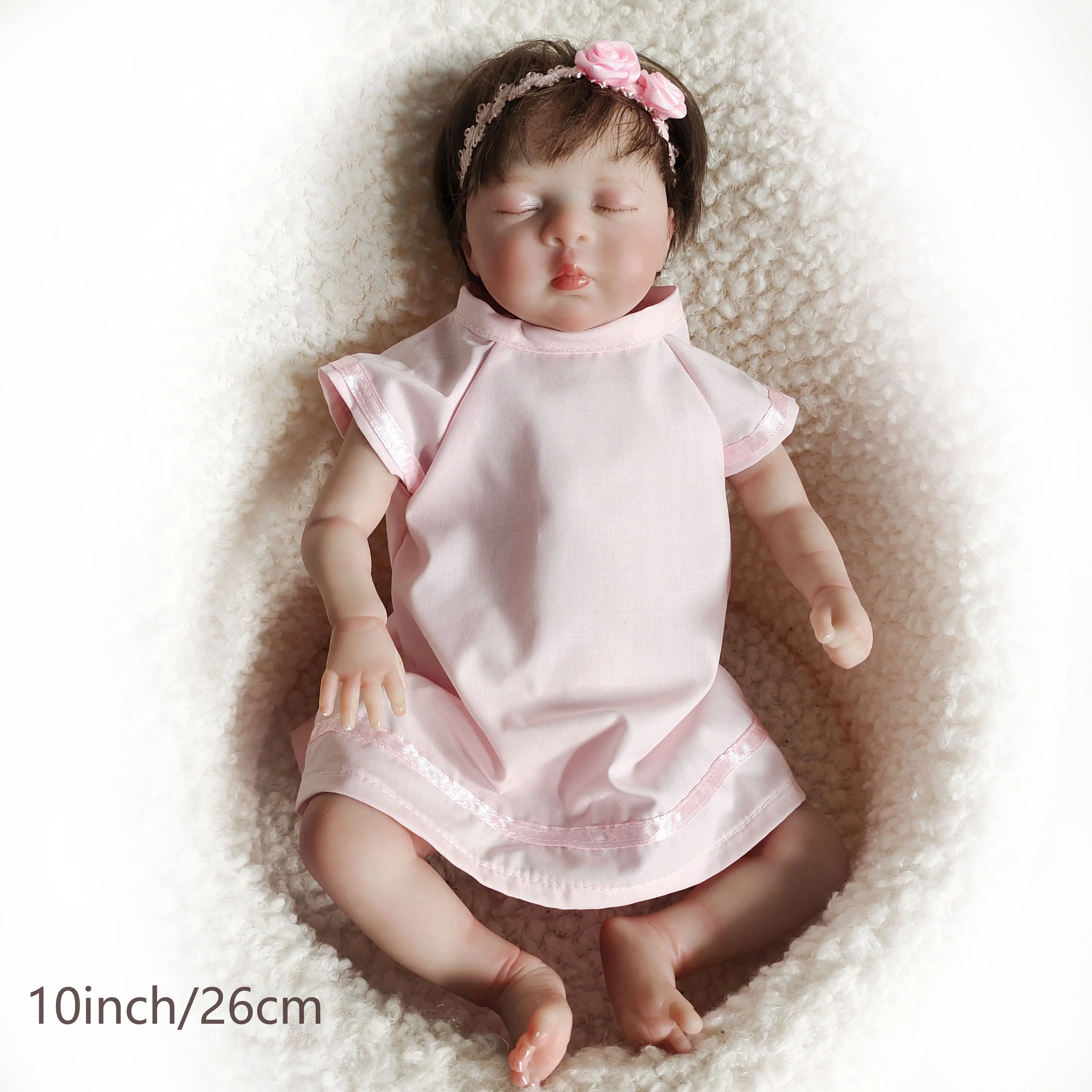 1 mini muñeca Reborn de 10 pulgadas y 26 cm, con vestido rosa, linda muñeca de simulación de realidad, pelo con raíces a mano,