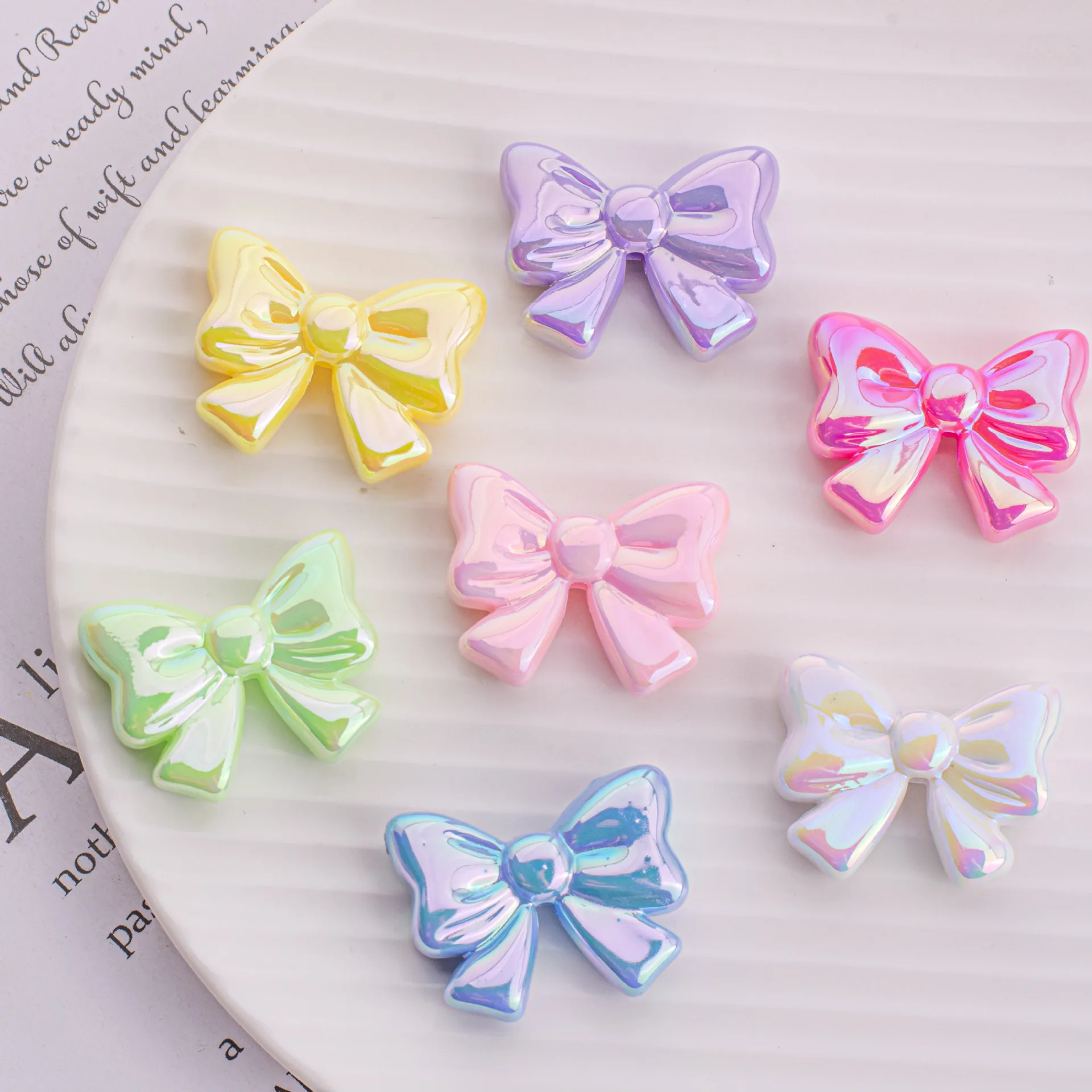 

Wholesale 100pcs 32*25mm Bright UV Coated AB Pastel Colors Ribbon Knot Bow Beads Fit Girl Necklace Earring Bracelet Accessory