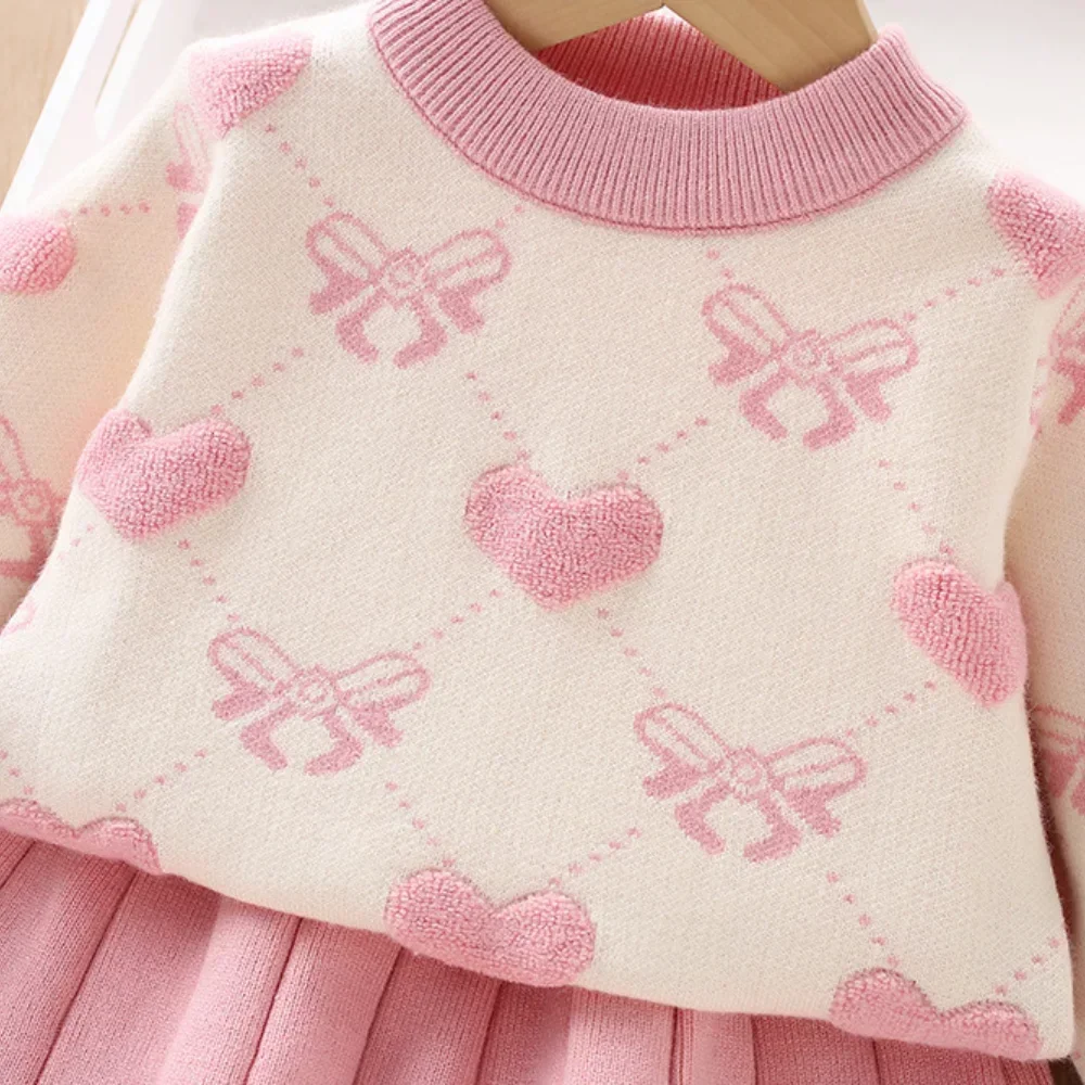 Zimowy zestaw ubrań dla dziewczynek w wieku 3-7 lat: różowy, słodki sweter z długim rękawem i spódniczka plisowana.