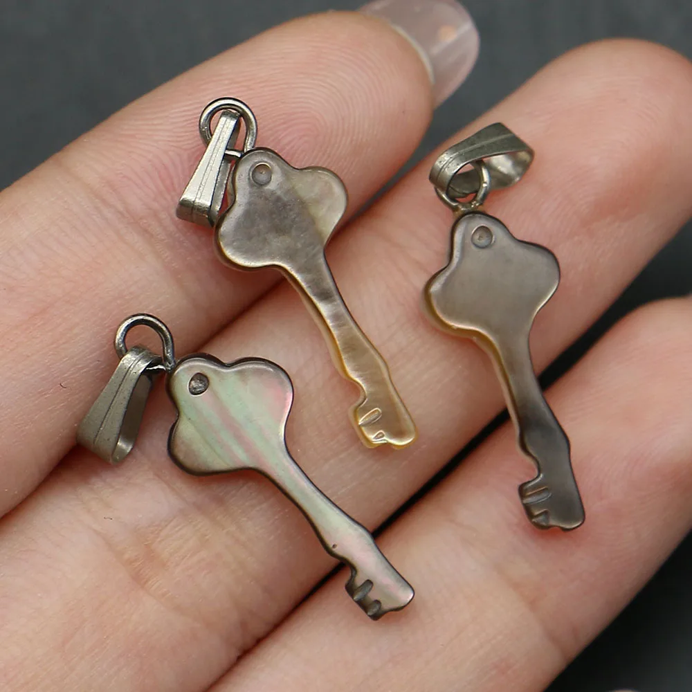 

Carved Key-Shaped Natural Iridescent Black Shell Pendant 9x24mm Polished Sea Shell Unique Necklace Key Chain Jewelry Component