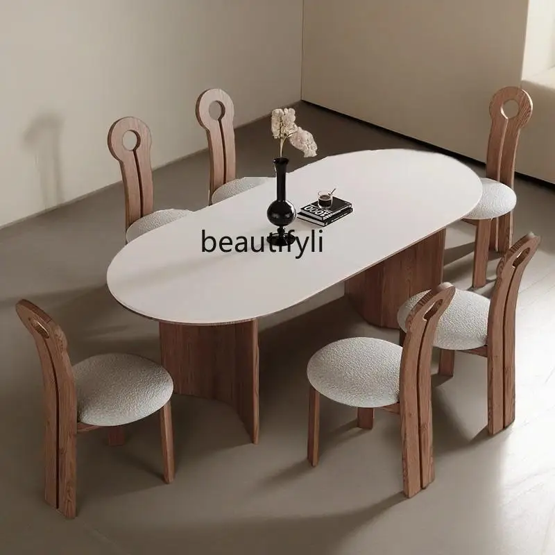 

Nordic natural travertine rock slab dining table small apartment designer retro table and chair combination