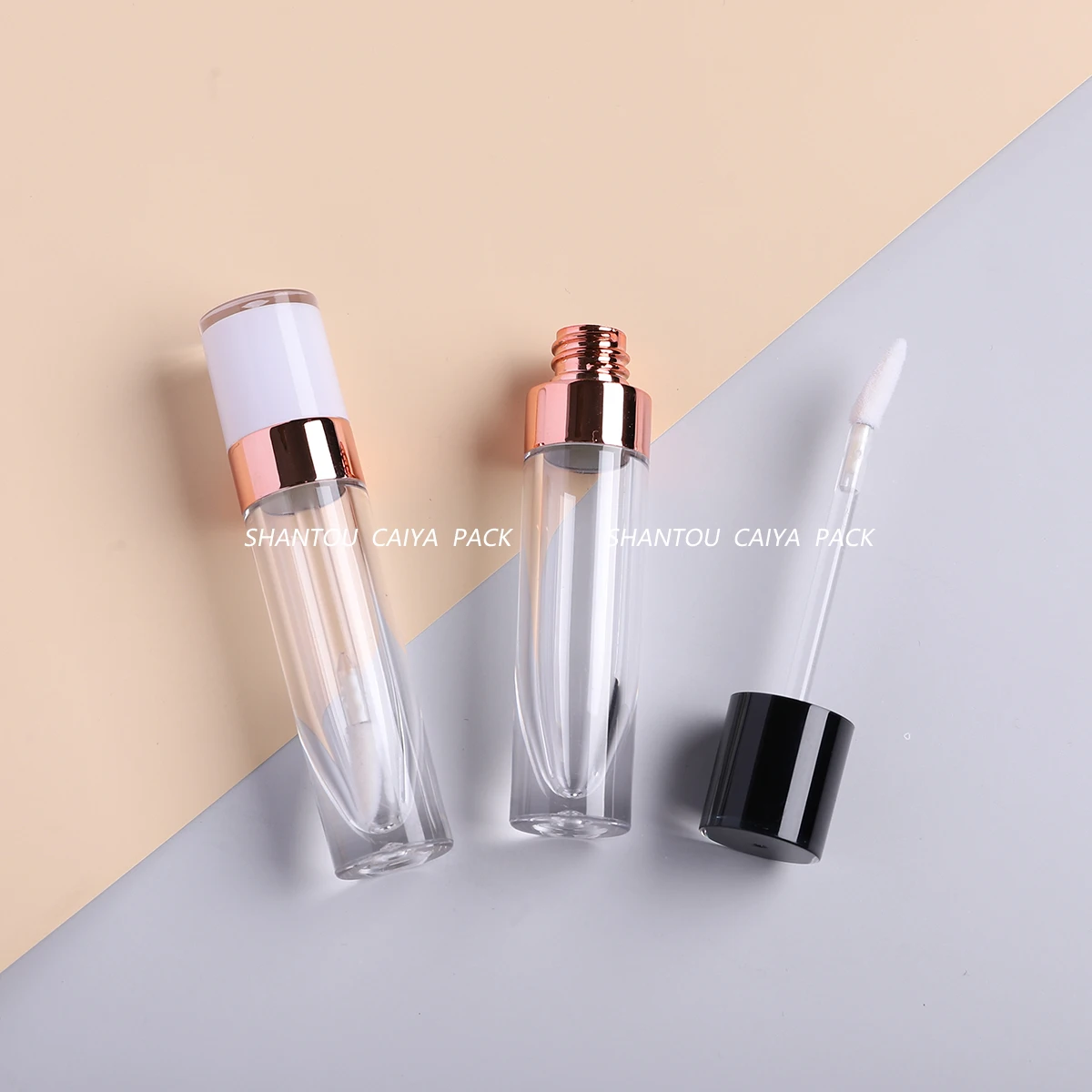 

Hot Selling 6ml Thick Wall Clear Lipgloss Tube with Wand Brush Cosmetic Lip Gloss Packaging Container in White Black Lid