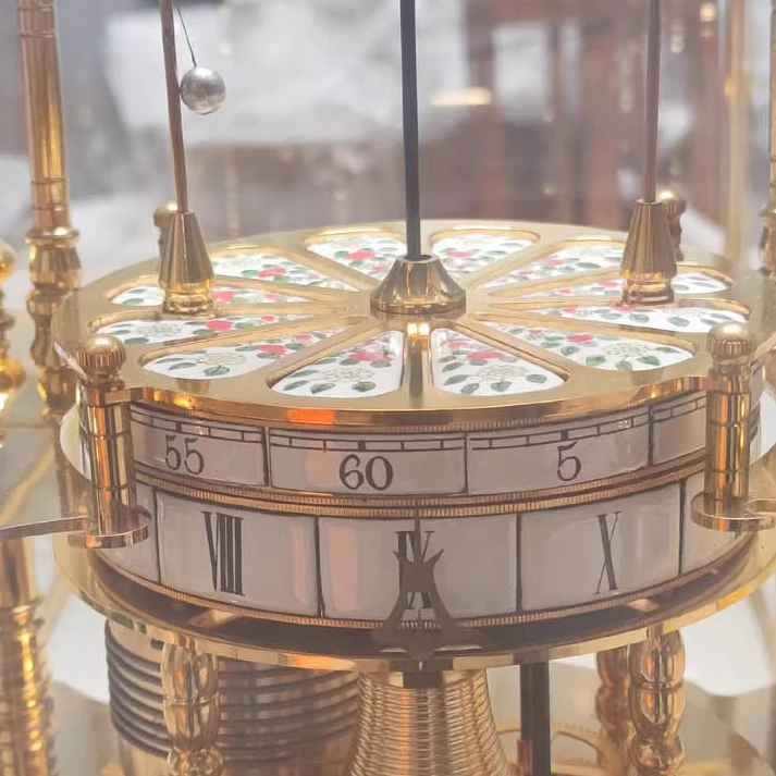 Vintage Gold Brass Porcelain Dial Flying Ball Pendulum Swing Mechanical Desk Clock/Watch