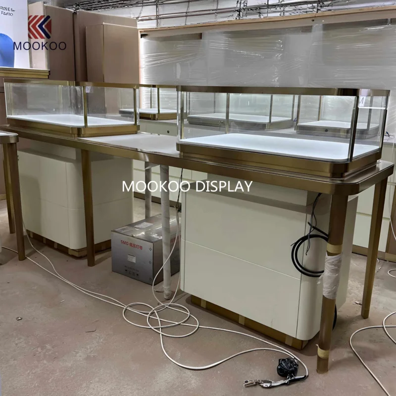 custom.Elegant Stainless Steel Jewelry Store Fixtures LED Light Watch Display Cabinet and Table Jewellery Shops