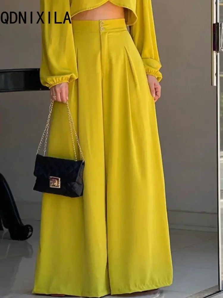 Nuovo Set di due pezzi moda estiva elegante Top irregolare vita alta gamba larga pantalone Set manica lunga giallo Sexy Top coordinati