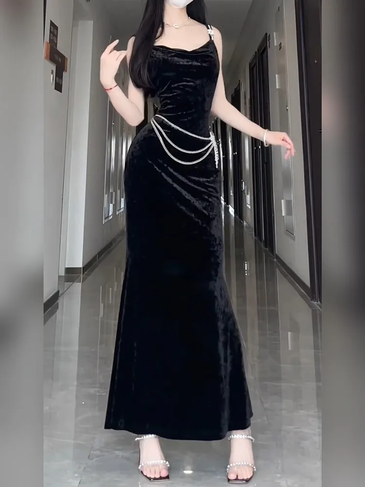 

A large-sized elegant and stylish black velvet halter fishtail dress