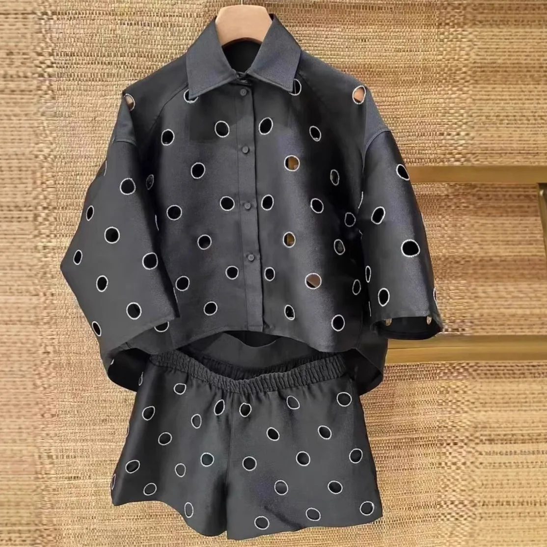 

Women's black casual two-piece suit with hollowed-out short-sleeved shirt or casual shorts