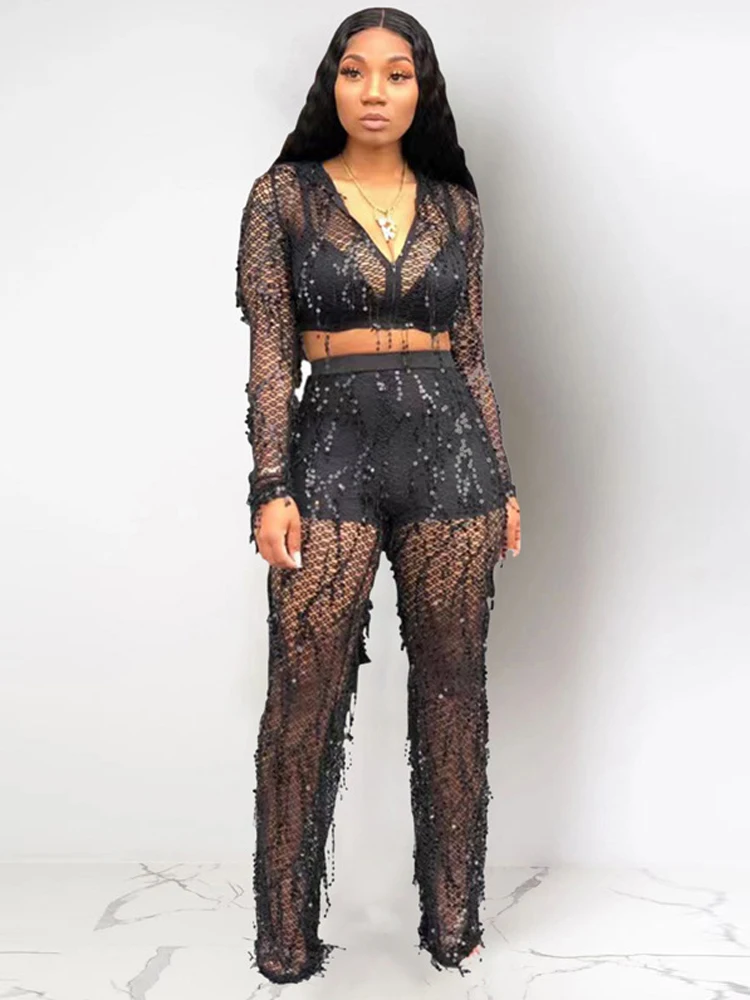 

2024 Black Long Sleeved Sexy Lace Mesh Spliced Tassel Cutting Women's Wide Legged Pants Hooded Nightclub Party Two Piece Set